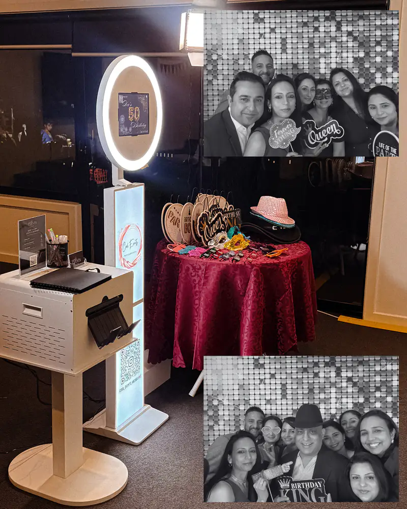 The booth and prop table with guest prints from the night